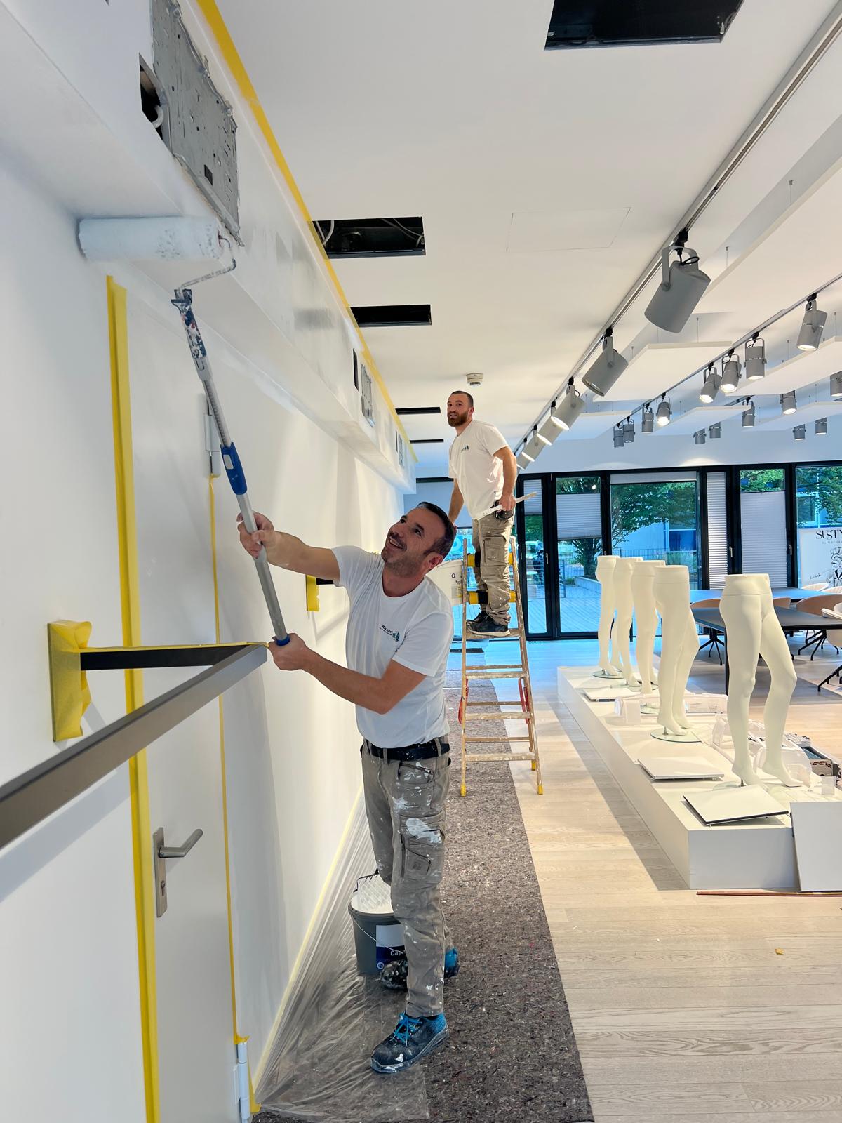 Teamarbeit bei Paint One auf der Baustelle